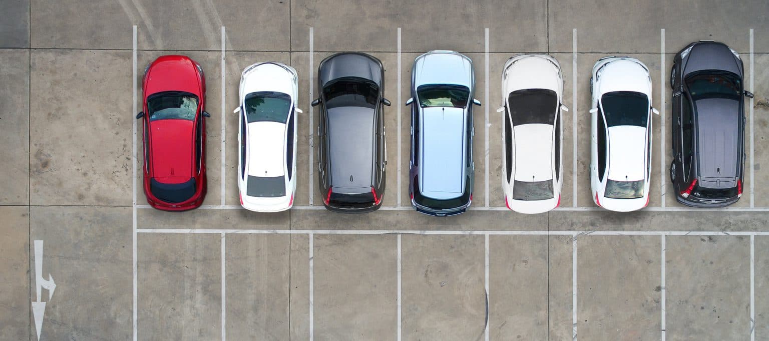 Vehicles parked in marked parking bays